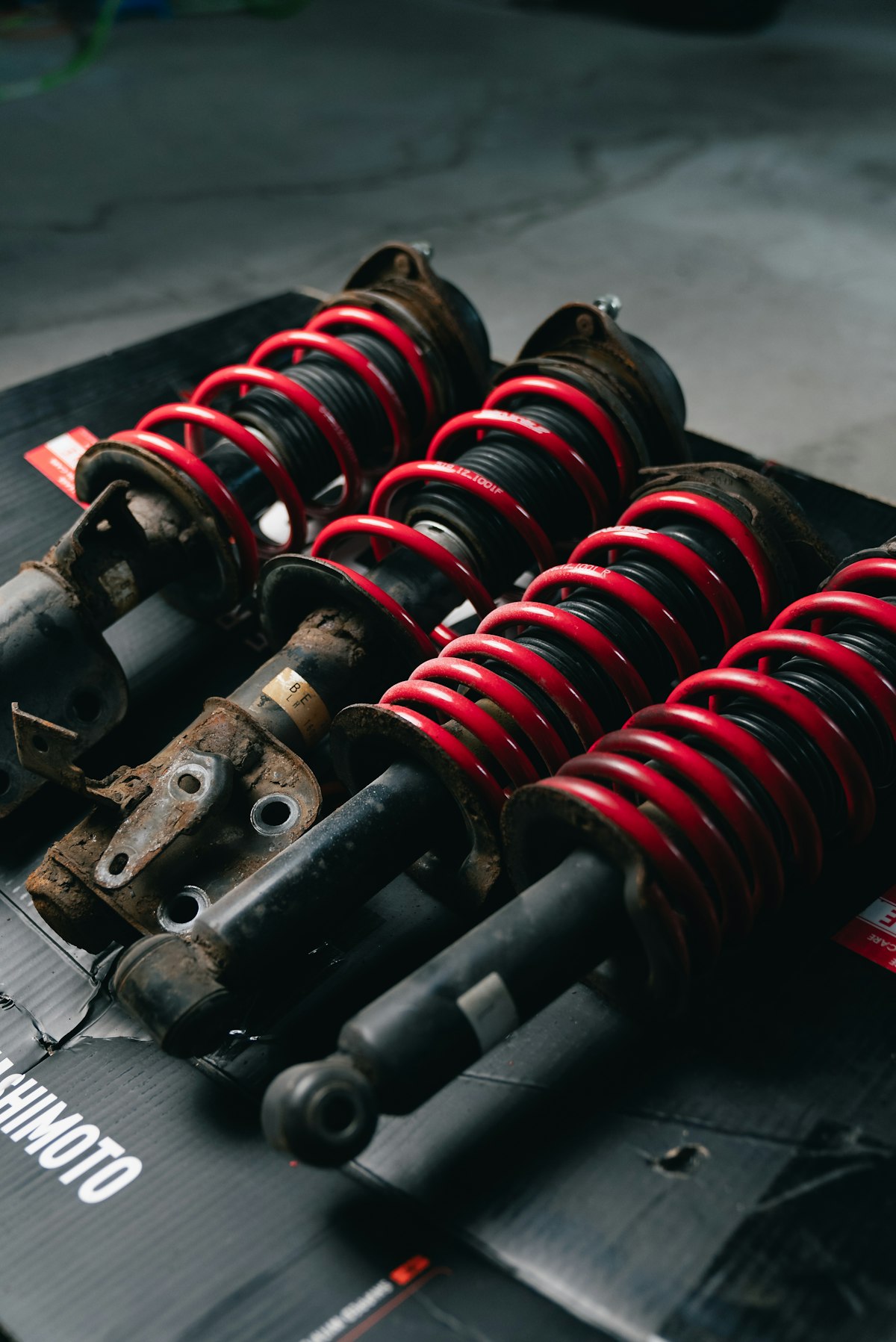 Set of four red adjustable coilover units
